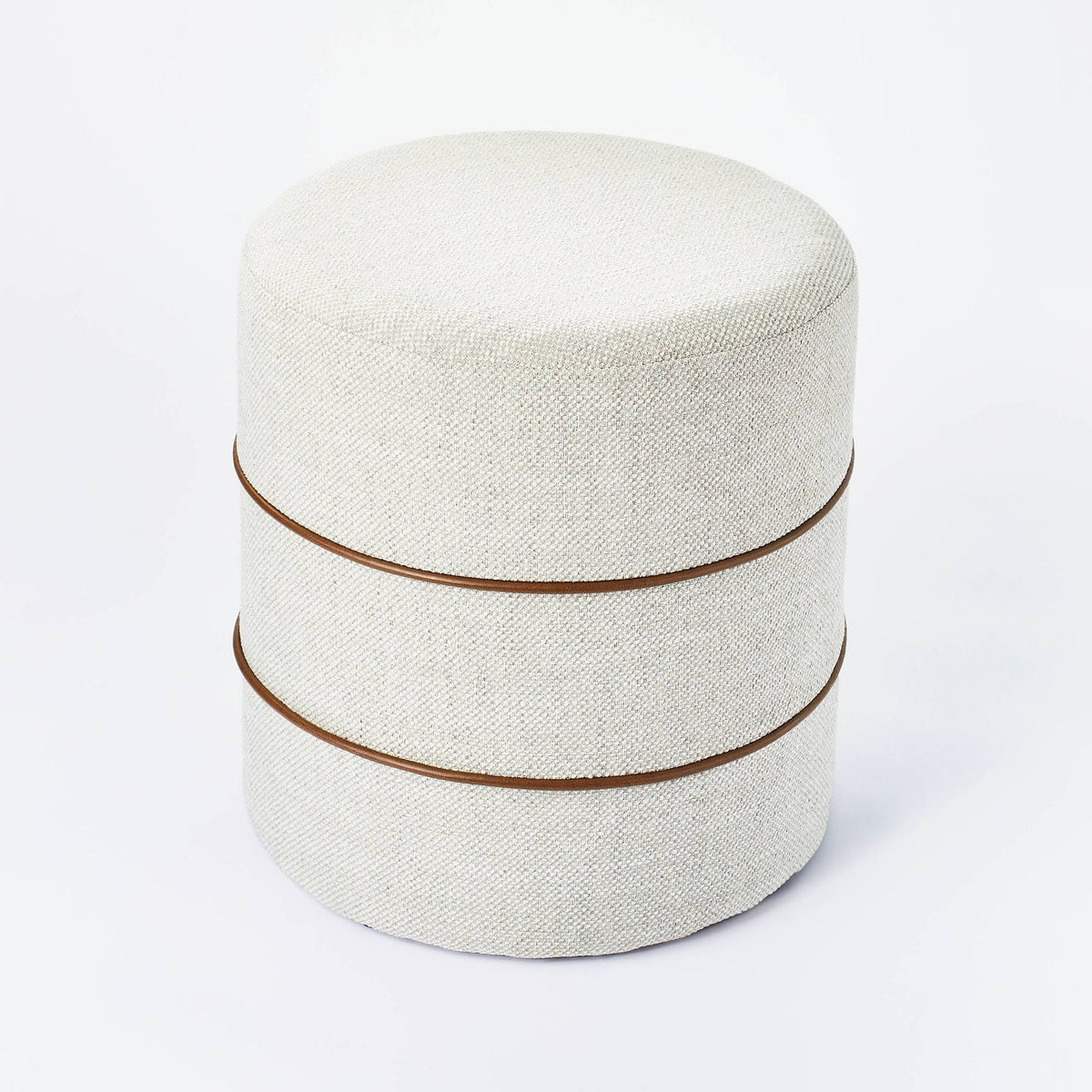 Cream Round Ottoman with Leather Piping D749358